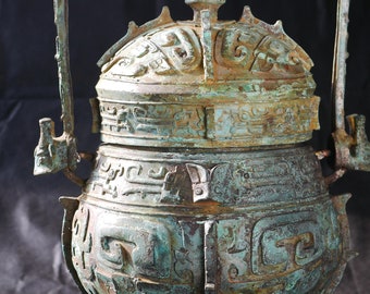 USD 600,000,- A rare bronze ritual wine vessel and cover, "you", Eastern Zhou /1050-771 BCE copper metal silver handmade 铜 Chinese New Year