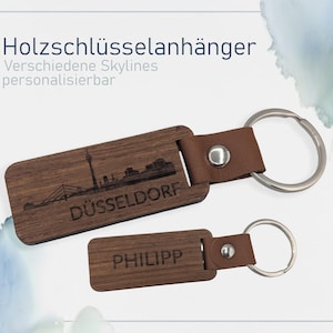 Personalisierter Holzschlüsselanhänger mit Skyline – z. B. Berlin, Düsseldorf | Gravur mit Wunschname | Geschenkidee