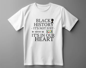 May include: White t-shirt with the text "BLACK HISTORY - IT'S NOT JUST - HISTORY - IT'S IN OUR HEART" in black font. The design includes a silhouette of a person and a graphic with green, black, and red elements.