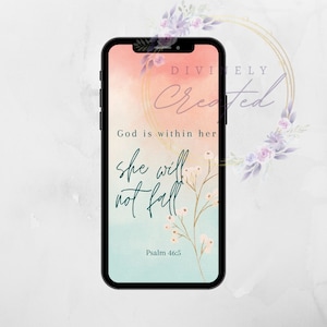 May include: A phone screen with a pink and blue watercolor background. The text "God is within her, she will not fall, Psalm 46:5" is displayed on the screen. The words "Divinely Created" are in a gold circle at the top of the screen.