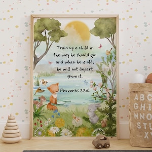 May include: A framed print with a whimsical illustration featuring a fox, rabbit, and birds near a lake. The artwork includes the text "Train up a child in the way he should go: and when he is old, he will not depart from it. Proverbs 22:6."