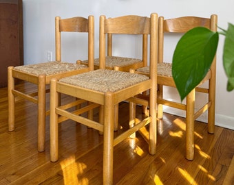 A Set of Four Vintage Rush Seat Dining Chairs