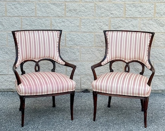 A Pair of Grosfeld House Style Ebonized Armchairs