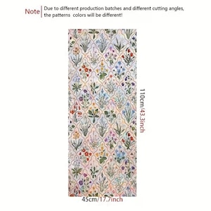 May include: A rectangular fabric with a floral design. The pattern includes flowers and foliage in red, blue, purple, and green, on a light background. The fabric dimensions are 45cm x 110cm (17.7in x 43.3in).