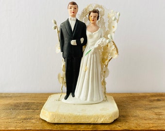 Vintage 1950's chalkware bride and groom wedding cake topper
