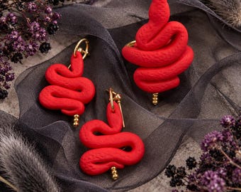 Set di anello e orecchini a forma di serpente a sonagli rosso