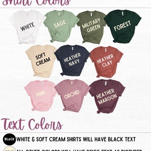 May include: A chart showing different t-shirt colors with text indicating the color of the shirt and the color of the text that will be printed on the shirt. The text states that white and soft cream shirts will have black text and all other colors will have beige text.