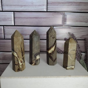 Septarian Point. Natural Crystals. Hand carved crystals. Beautiful colors. Dragon stone tower. Aragonite calcite and limestone mix.