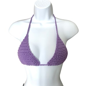 May include: A purple crocheted bikini top with triangle cups and adjustable straps.