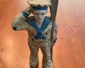 Vintage 5 1 4 inch Sailor Cast Iron Bank, in salute pose with Oar