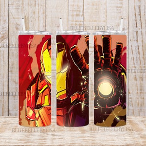 May include: Three stainless steel tumblers with a red, yellow, and orange design featuring a superhero character. The design includes the character's face, hand, and a glowing light effect. The tumblers are all the same size and have a straw.