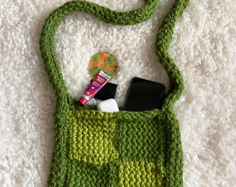 green cross-body knit handbag