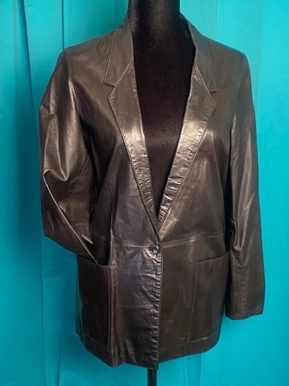 Chic Black Leather Daytime/Nighttime Jacket