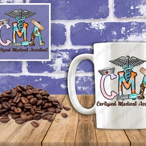 May include: White ceramic coffee mug with a colorful graphic of a medical symbol, a stethoscope, and the letters CMA, which stand for Certified Medical Assistant. The letters are decorated with a variety of patterns, including a blue and orange watercolor design, a leopard print, and a bandage.