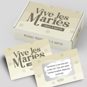 Peut inclure: Un coffret de cartes à gratter pour mariage avec l'inscription "Vive les Mariés". La boîte et les cartes sont beige clair avec des motifs floraux. Une carte révèle un message après grattage.