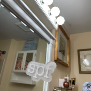 SPF Mirror Cling – Påminnelse om solskyddsmedel, hudvårdshack