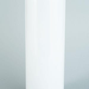 May include: A tall, cylindrical white tumbler with a smooth, glossy finish. The drinkware features a clear, transparent plastic lid that sits securely on top. The design is simple and vertical, providing a clean surface for customization or use.