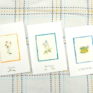 Ensemble de 3 cartes de voeux florales peintes à l'aquarelle. Ne m'oubliez pas, coquelicots bleus et camomille.