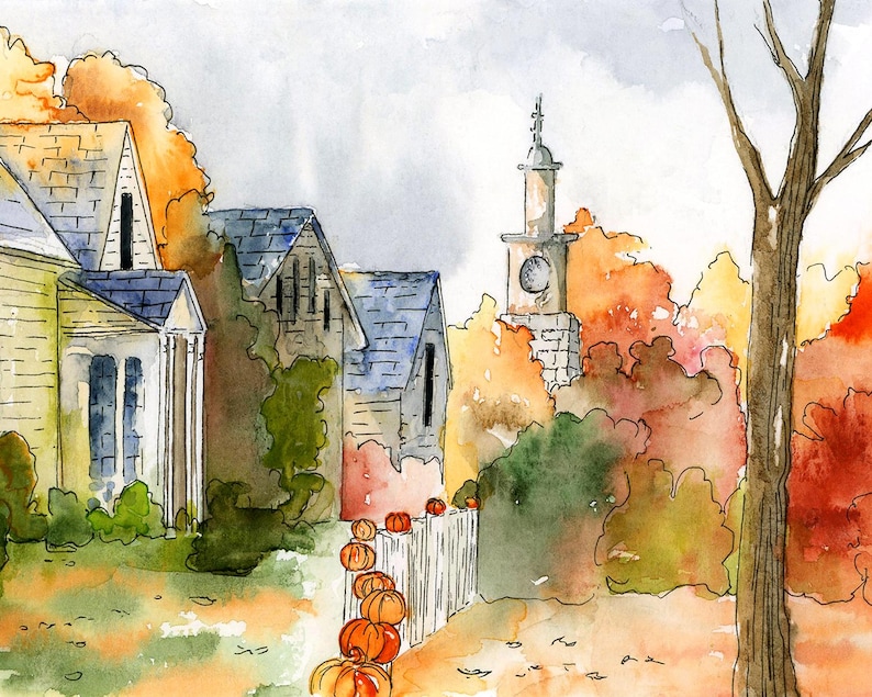 May include: Watercolour painting depicting a charming neighbourhood scene with houses, a church steeple, and autumn foliage. A line of pumpkins sits in front of a white picket fence.