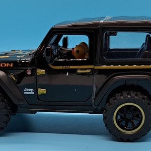 Duck driven die cast toy jeep -(disclaimer) not associated with the Jeep corporation nor it&#39;s affiliates. Active