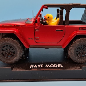 Duck driven die cast toy jeep -(disclaimer) not associated with the Jeep corporation nor it&#39;s affiliates.