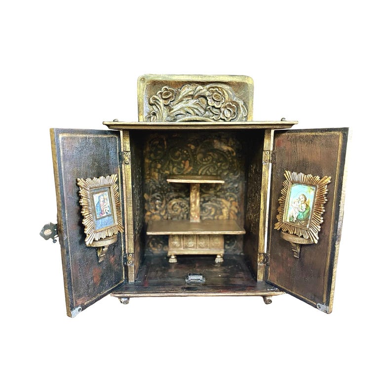 open cabinet shower with gold frames on top of door shelves. a two trier credenza - included,