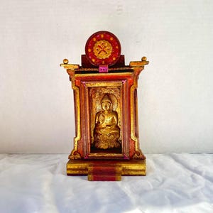 Small Buddhist shrine , Traveling altar.Tibetan Prayer shrine. Wall shrine.
