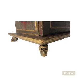 skull feet hold up ancestral Memorial