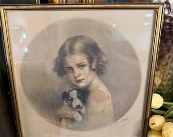 Vintage glass framed lithograph print of a girl and her puppy with the artist's signature.