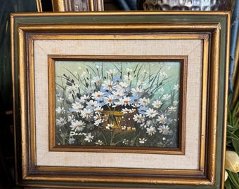 Vintage framed oil painting of a basket of daisies, signed by the artist,  1970s or 1980s