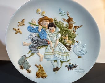Vintage Norman Rockwell collector plate titled "Spring - Sweet Song So Young." 