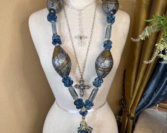 Vintage art deco or artisan-crafted necklace with large focal beads and intricate glasswork