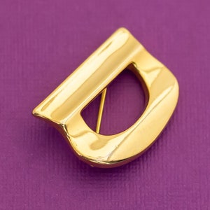 Broche Vintage Minimalista Inicial "D" Tono Dorado - Q1