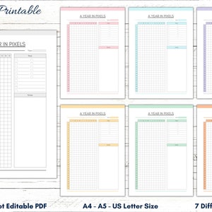 以下が含まれることがあります： A4、A5、USレターサイズの「1年をピクセルで」トラッカーが7種類、それぞれ異なる色（ピンク、ブルー、イエロー、グリーン、ライトブルー、オレンジ、パープル）で用意されています。各トラッカーには、1年の365日分のグリッド、メモ欄、そして「1年をピクセルで」というタイトルがあります。