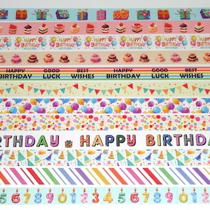 May include: Assortment of colorful washi tapes with birthday themes. The tapes feature various designs, including balloons, confetti, cakes, presents, and the words "Happy Birthday", "Good Luck", and "Best Wishes".