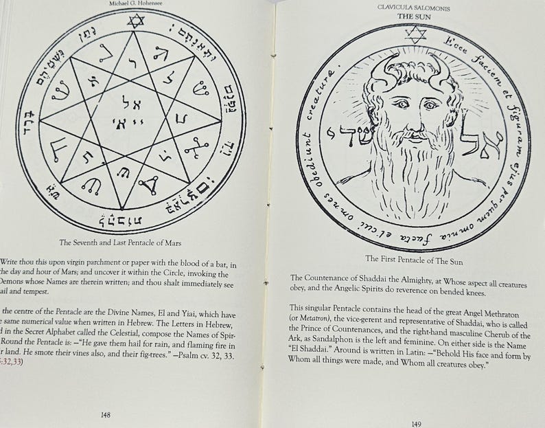 May include: An open book displaying two black and white illustrations of mystical symbols and text. The left page shows a star-shaped diagram with Hebrew text. The right page features a bearded figure within a circular design.