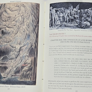 May include: Open book with illustrations and text. One page features a William Blake artwork, "Queen Katherine's Dream." The opposite page displays a black and white illustration and text from "Clavicula Salomonis."