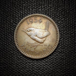 Cute farthing coin featuring a Eurasian wren bird - Random year - Please read description