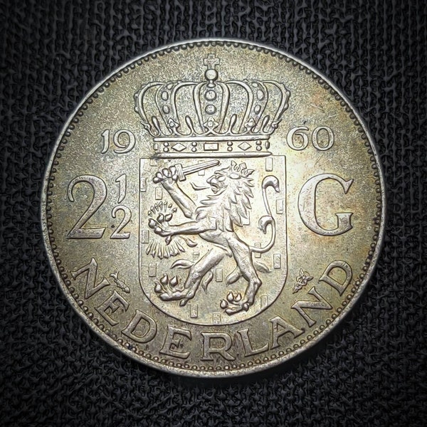 1960 silver coin uncirculated 2 1/2 gulden from the Netherlands