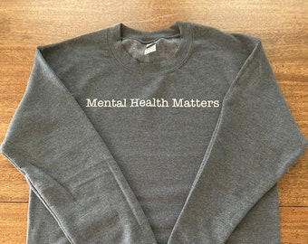 Sudadera de cuello redondo con mensaje "Mental Health Matters": corte unisex inspirador