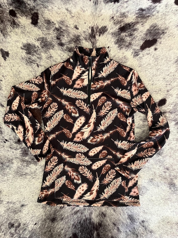 The Feathered Grace Quarter Zip