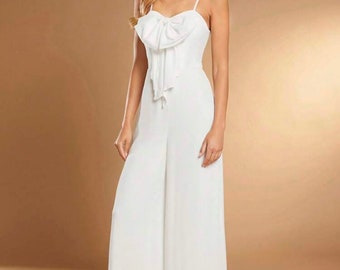 Elegante lange jumpsuit | Witte jumpsuit | Kanten korsettop | Steentjes | Ceremoniepak | Trouwjurk | Rompertjes | Wijde pijpen broek bruids | Pak