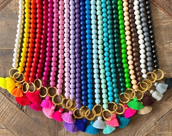 Mobile phone chain made of wooden beads