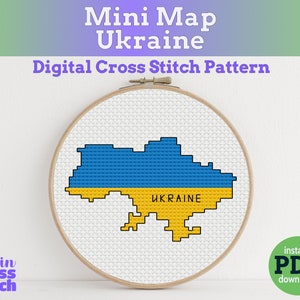 May include: A digital cross stitch pattern of a map of Ukraine in the colors of the Ukrainian flag, blue and yellow. The pattern is labeled "UKRAINE".