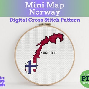 May include: A white ceramic mug with a black handle and the text "But First, Coffee" in a bold, black font. The mug is set against a blurred background, suggesting a cozy setting.