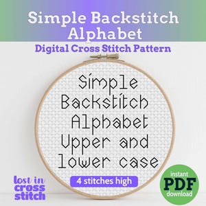May include: A wooden embroidery hoop containing white Aida fabric with black cross-stitched text that reads Simple Backstitch Alphabet Upper and lower case. The text 4 stitches high is in a purple box. The logo Lost in Cross Stitch is visible.