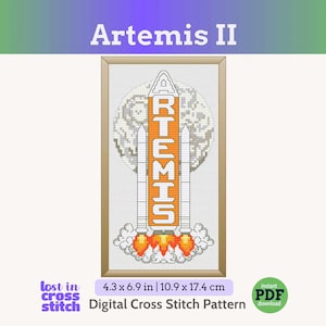 May include: A framed cross-stitch pattern featuring the Artemis II rocket launching. The rocket is white and orange, with the word "ARTEMIS" vertically displayed. The background includes a gray moon and flames. The pattern measures 4.3 x 6.9 inches.