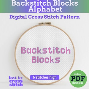May include: A cross-stitch hoop with the words "Backstitch Blocks" in pink, set against a white fabric background. The text "Digital Cross Stitch Pattern" is above the hoop. A green circle with "instant PDF download" is in the lower right.