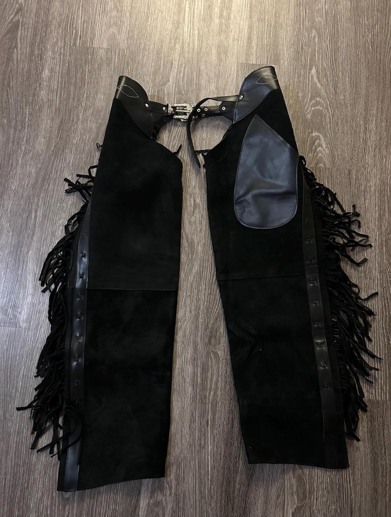 horse riding gifts, Equestrian gifts, Horse gifts, Custom horse gifts, western wear women, Rodeo, leather chap, Hand made, cowgirl birthday, cowgirl outfit, women western wear, chaps and chinks, cowgirl chap	

Suede Leather Chap, Western Style Chap, Riding Chap, Mountain Chap, Leather Chap, Womens Chap, Native Chap, Suede Leather Pant, Women western chap, Women Native Chap, women chaps, women chap, women leather chap