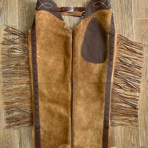 Western Women Chap, Buckskin Chap, Rodeo chap, Mountain Chap, Chinks chap, Women riding chaps, Ladies fringed chap, Gift for her, Women Leather pant

Western Women Chap, Buckskin Chap, Rodeo chap, Mountain Chap, Chinks chap, Women riding chaps, Ladies fringed chap, Gift for her, Women Leather pant, Rodeo leather chap, Women riding chap, Women western chap, Western wear chap
